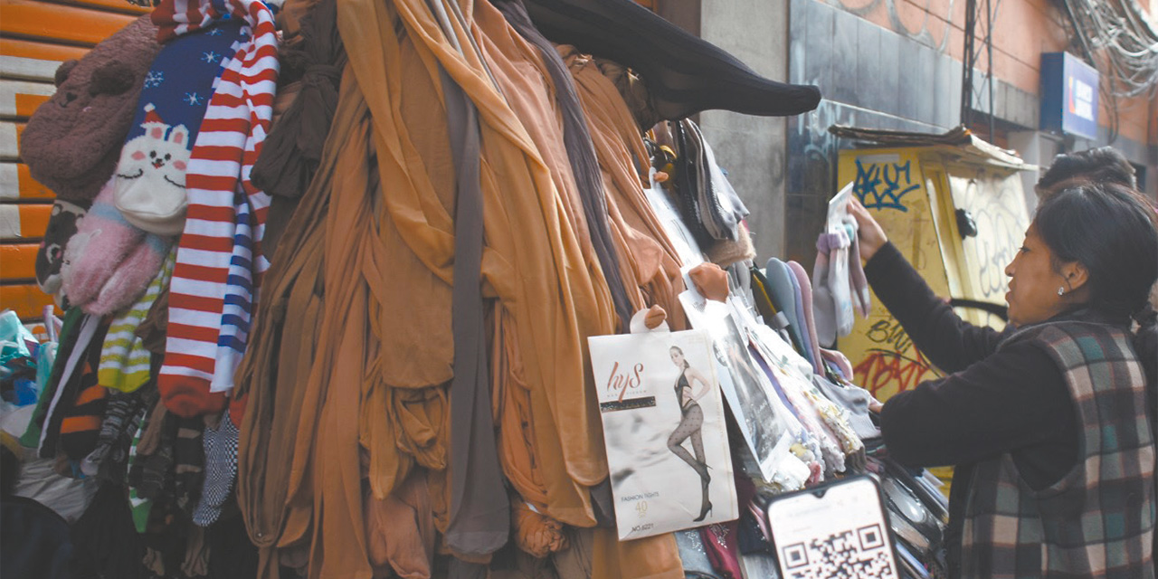 La compra y venta con el QR se populariza. Foto: Gonzalo Jallasi